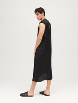 Abito sculpture dress nero vestibilità architetturale design contemporaneo