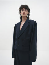 Giacca cropped blu vestibilità oversize design minimal